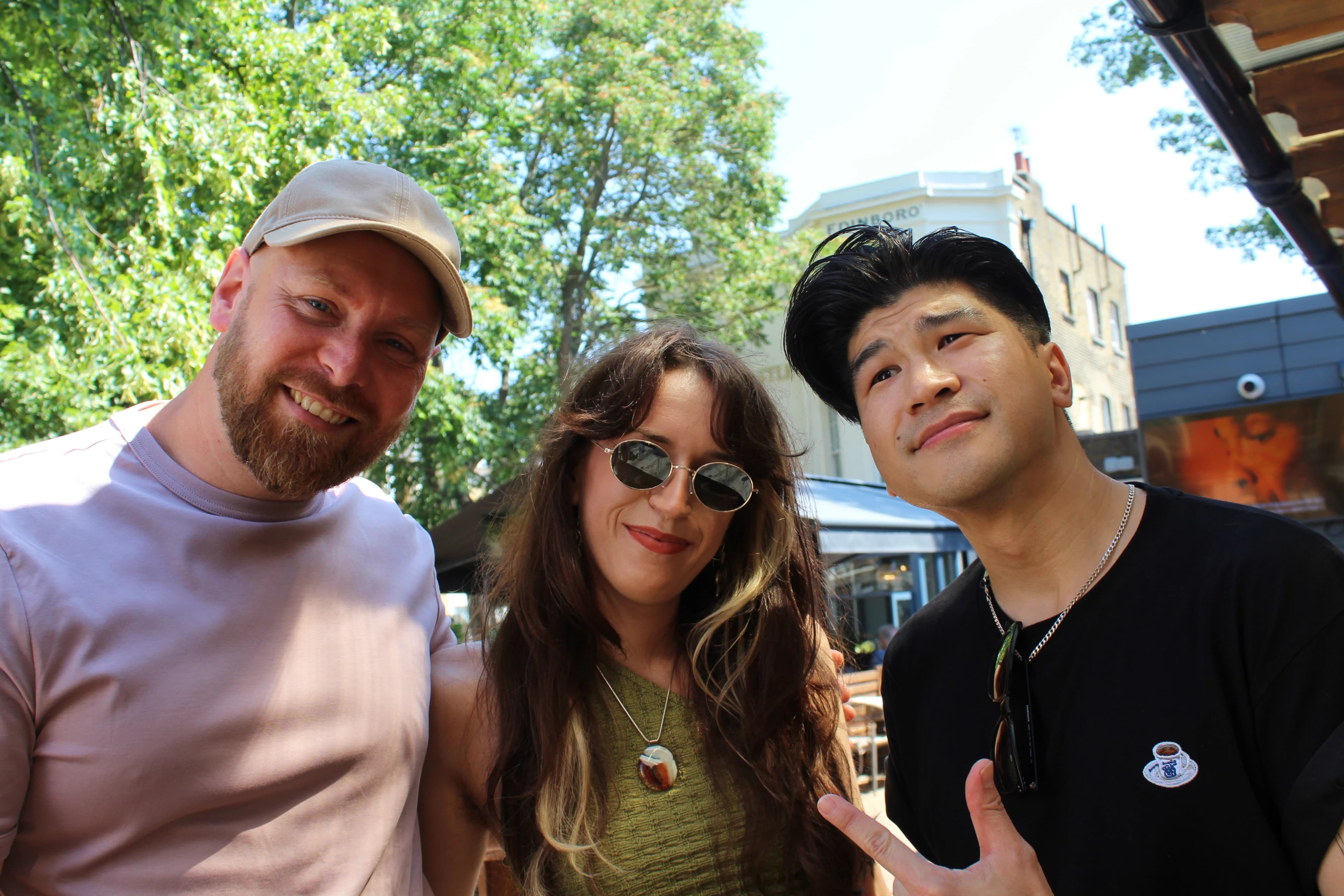 Three members of the Decent team enjoying an outdoor gathering